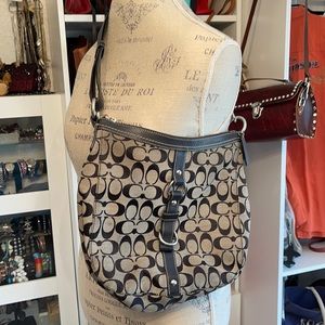 This is a Coach purse. Good condition. Some wear.